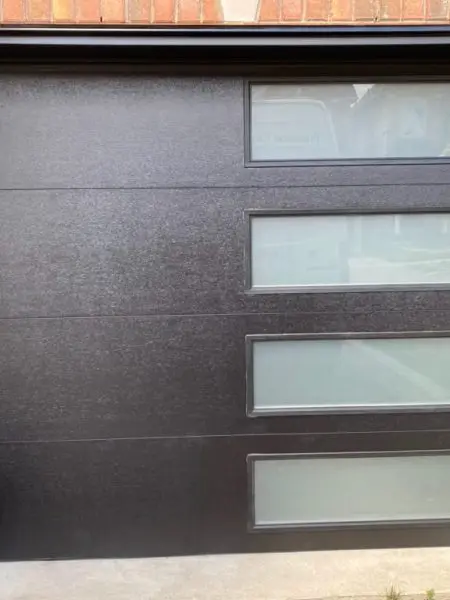 brown garage door with glass
